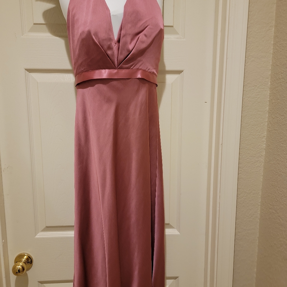 Pink bridesmaids dress approximent size is a 4.